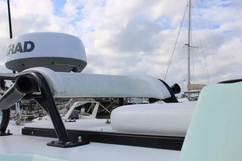 Slide: The Image of ZCB 26 Freemason 2021 boat with radar, docked under cloudy sky. - 12