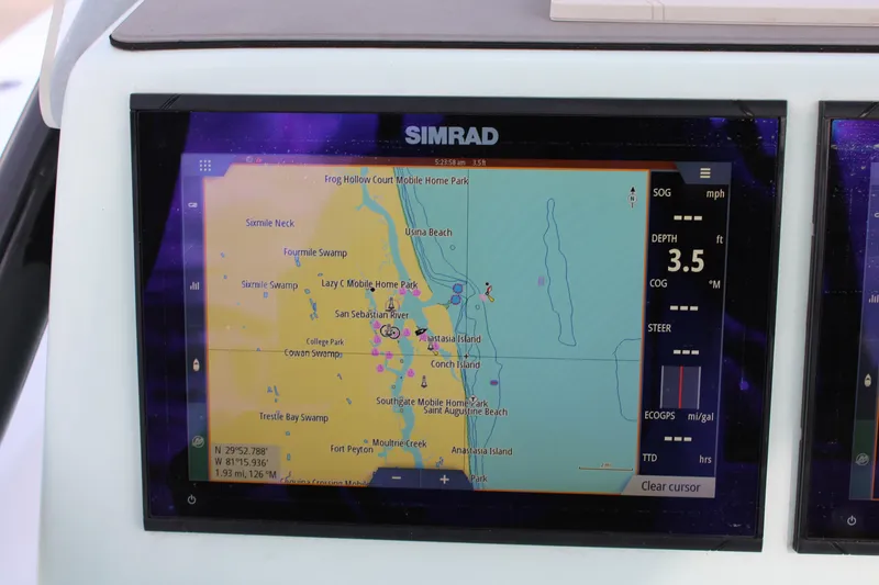 Slide: The Image of Simrad navigation display on ZCB 26 Freemason boat, showing map and depth data. - 18