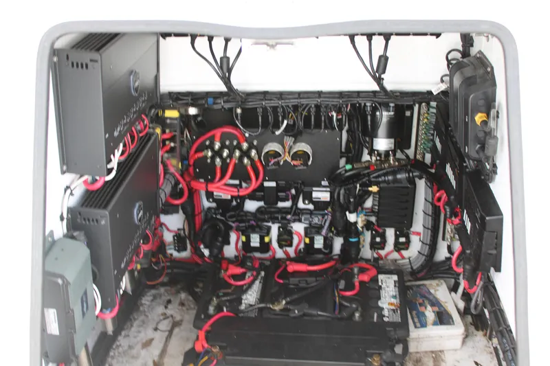 Slide: The Image of Electrical panel with complex wiring in a 2021 ZCB 26 Freemason model. - 28