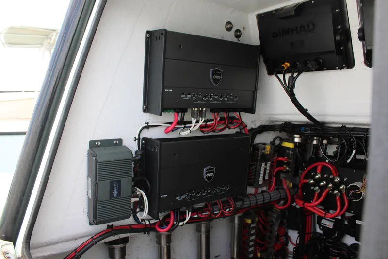 Slide: The Image of Electrical panel setup in a 2021 ZCB 26 Freemason boat. - 29