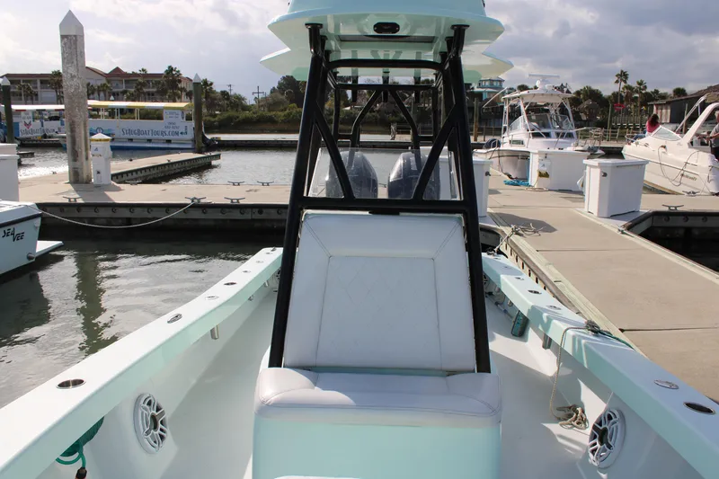 Slide: The Image of ZCB 26 Freemason 2021 boat docked at marina, featuring sleek design and comfortable seating. - 6