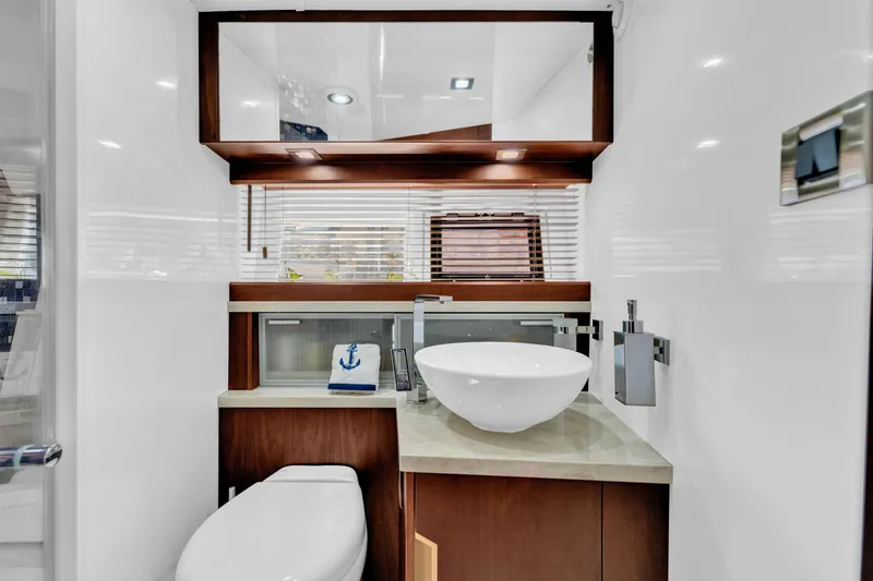 Slide: The Image of Luxurious bathroom in 2016 Galeon 430 HTC yacht with modern fixtures and elegant design. - 29