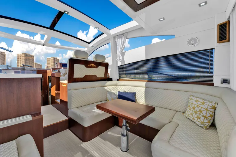 Slide: The Image of Luxurious interior of 2016 Galeon 430 HTC yacht with plush seating and modern design. - 36