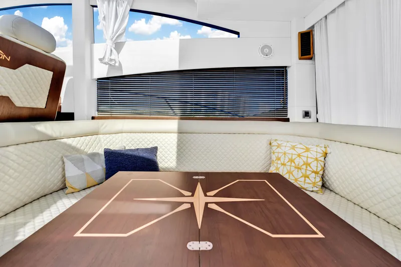 Slide: The Image of Luxurious interior of 2016 Galeon 430 HTC yacht with elegant seating and decorative pillows. - 37