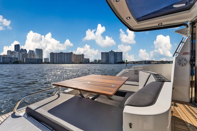 Slide: The Image of Galeon 430 HTC 2016 yacht with city skyline and waterfront view. - 46