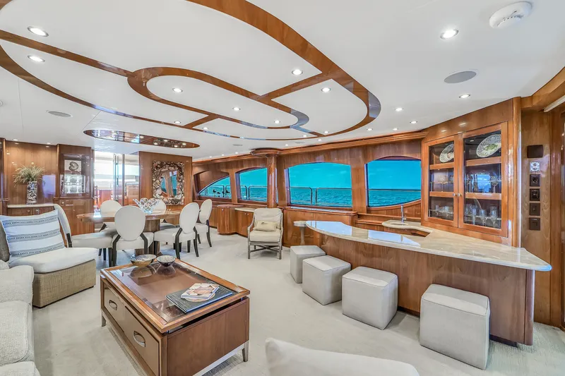 Slide: The Image of Luxurious interior of 2007 Hatteras 80 Motor Yacht with elegant wood finishes and ocean views. - 20