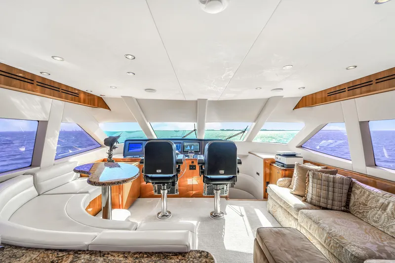 Slide: The Image of Luxurious interior of 2007 Hatteras 80 Motor Yacht with panoramic ocean views. - 32