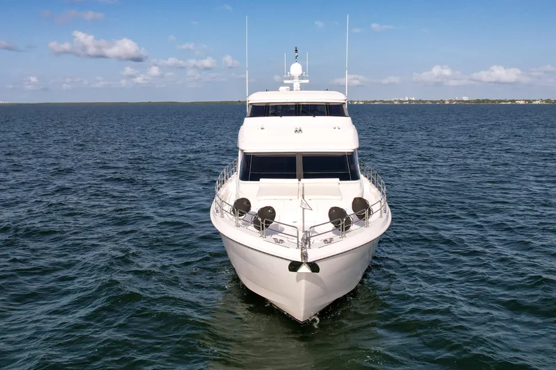 Slide: The Image of 2007 Hatteras 80 Motor Yacht cruising on open water. - 5