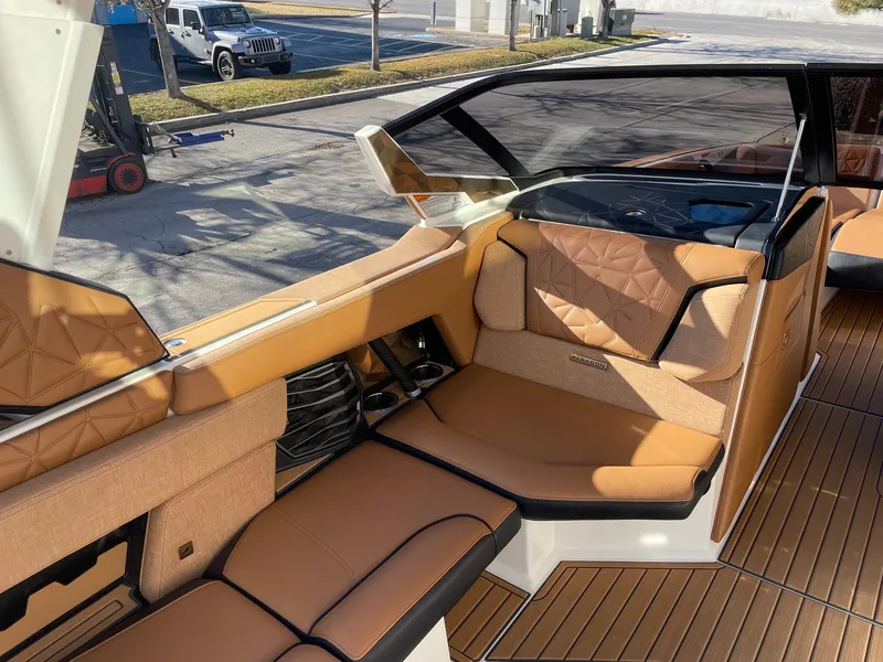 Slide: The Image of Luxurious interior of 2023 Nautique Super Air Nautique G25 Paragon boat. - 10