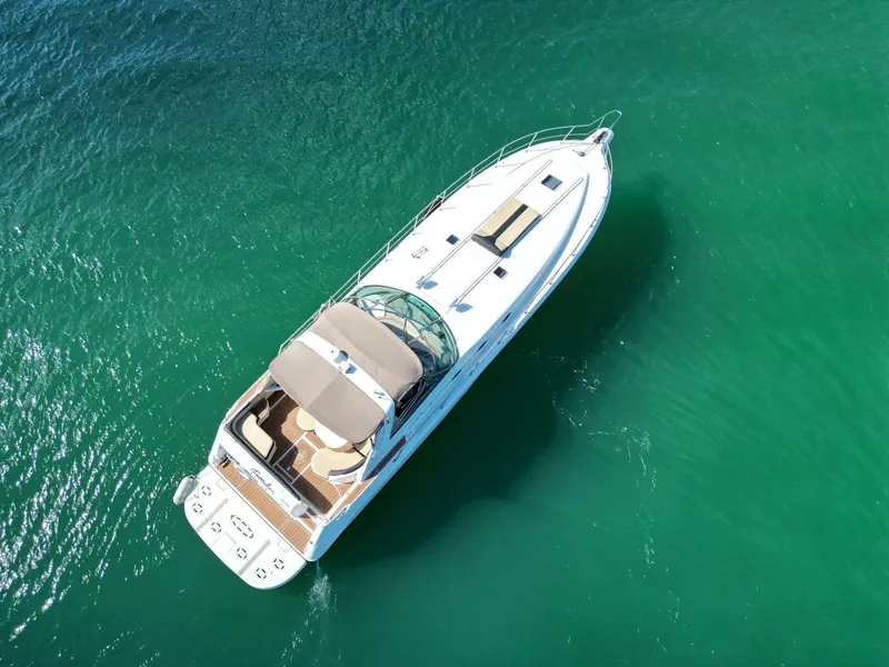 Slide: The Image of Aerial view of 1998 Sea Ray 500 Sundancer yacht on turquoise water. - 23