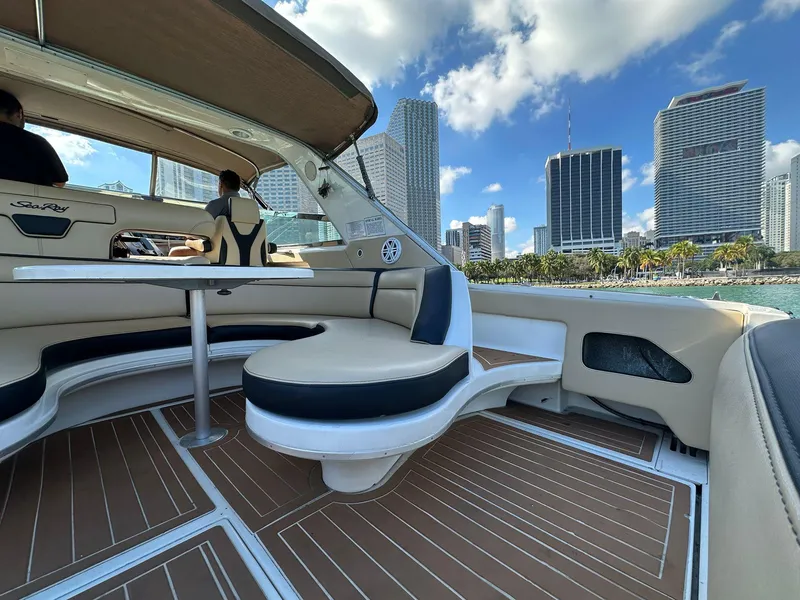 Slide: The Image of 1998 Sea Ray 500 Sundancer yacht interior with city skyline view. - 7