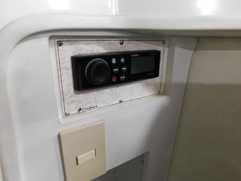 Slide: The Image of 1998 Cruisers 2870 Rogue boat stereo system with control panel. - 17