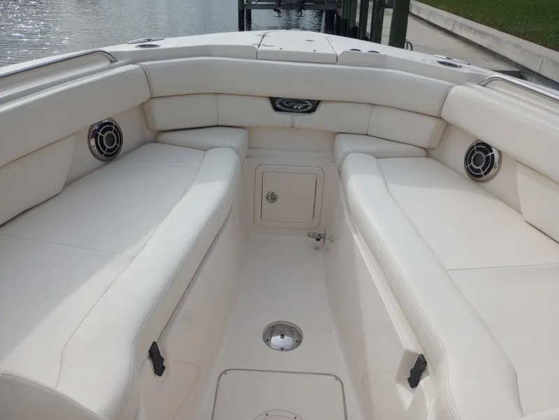 Slide: The Image of 2016 Grady-White Freedom 307 boat refrigerator interior with open drawer. - 21