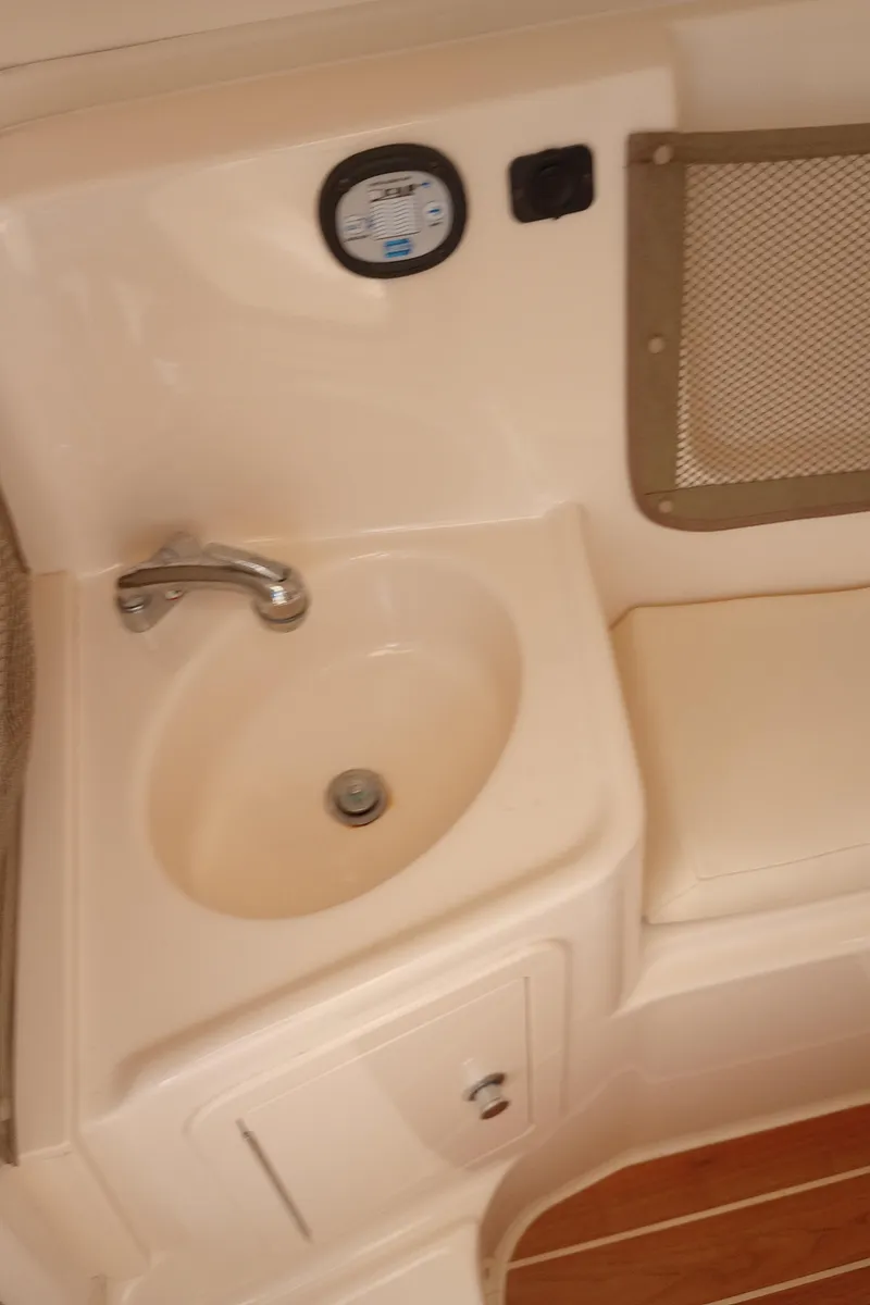 Slide: The Image of Compass on 2016 Grady-White Freedom 307 boat dashboard. - 33