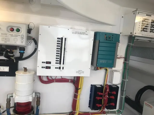 Slide: The Image of Electrical panel and components in 2016 Viking 42 Open boat. - 19