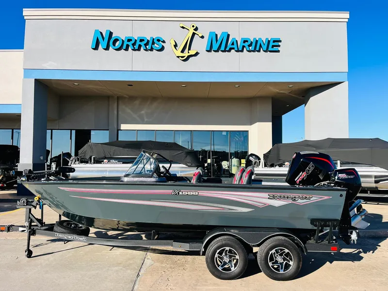 Slide: The Image of 2025 Ranger VX1988 WT boat displayed at Norris Marine dealership. - 1
