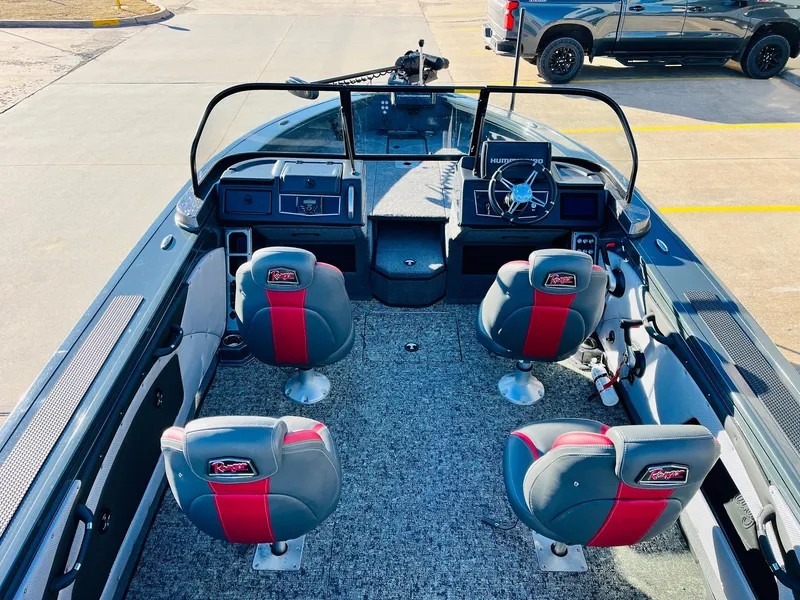 Slide: The Image of 2025 Ranger VX1988 WT boat interior with four seats and steering console. - 10