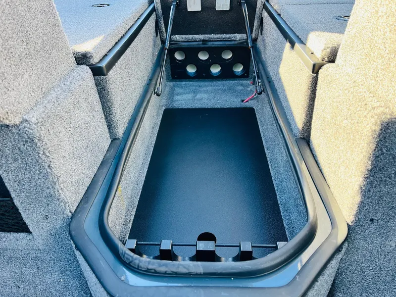 Slide: The Image of 2025 Ranger VX1988 WT boat interior storage compartment, featuring durable design and ample space. - 25