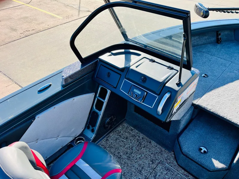 Slide: The Image of Interior of 2025 Ranger VX1988 WT boat with modern dashboard and seating. - 28