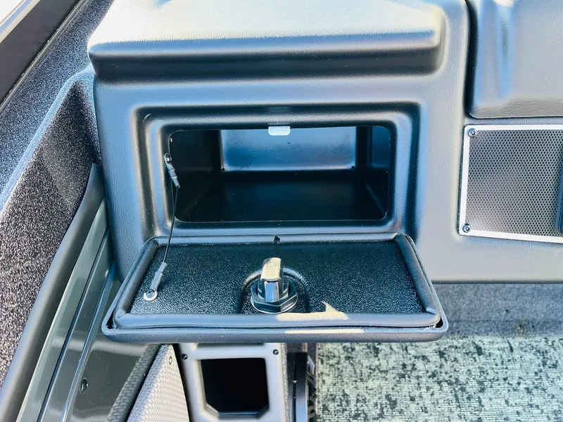 Slide: The Image of Open storage compartment in 2025 Ranger VX1988 WT boat interior. - 32