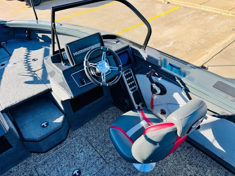 Slide: The Image of Interior of 2025 Ranger VX1988 WT boat with steering wheel and control panel. - 33