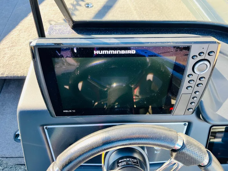 Slide: The Image of Humminbird Helix 10 fishfinder on Ranger VX1988 WT 2025 boat dashboard. - 35