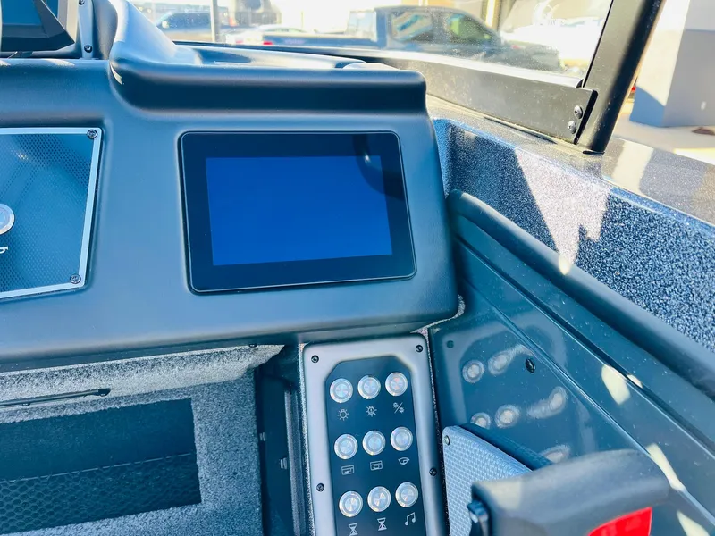 Slide: The Image of 2025 Ranger VX1988 WT dashboard with touchscreen and control panel. - 36