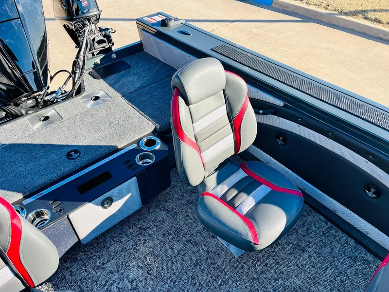 Slide: The Image of 2025 Ranger VX1988 WT boat interior with gray and red seating. - 39