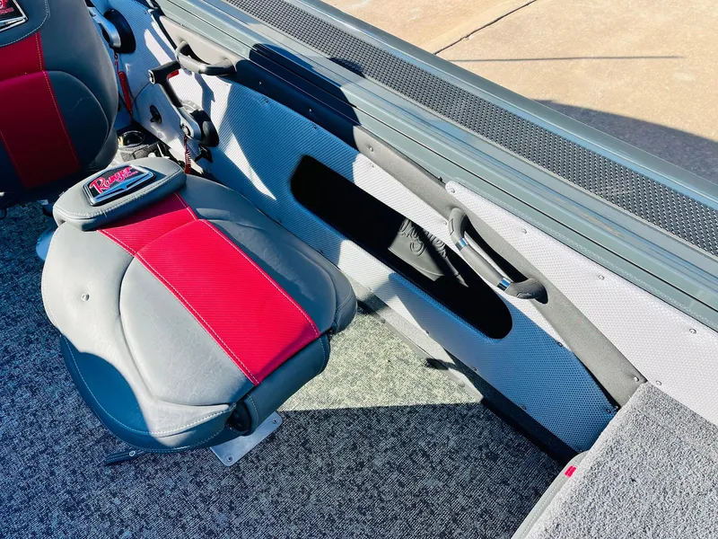 Slide: The Image of 2025 Ranger VX1988 WT boat interior with red and gray seating. - 43