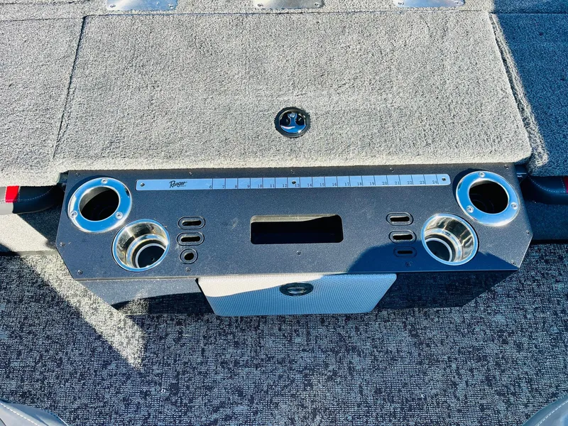 Slide: The Image of Control panel of 2025 Ranger VX1988 WT boat with cup holders and ruler. - 45
