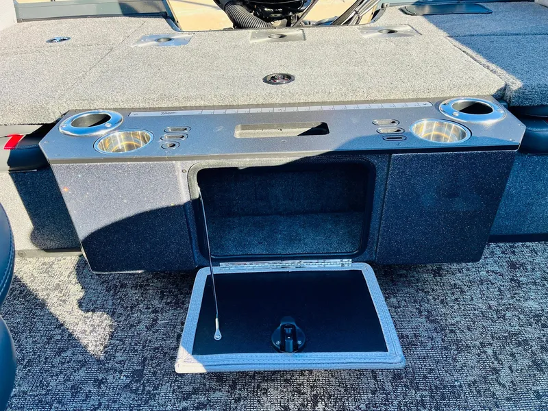 Slide: The Image of Ranger VX1988 WT 2025 boat interior with storage compartment and cup holders. - 46