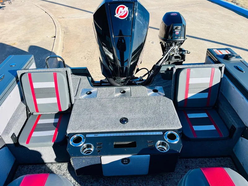 Slide: The Image of 2025 Ranger VX1988 WT boat interior with seating and motor, featuring modern design and functionality. - 47