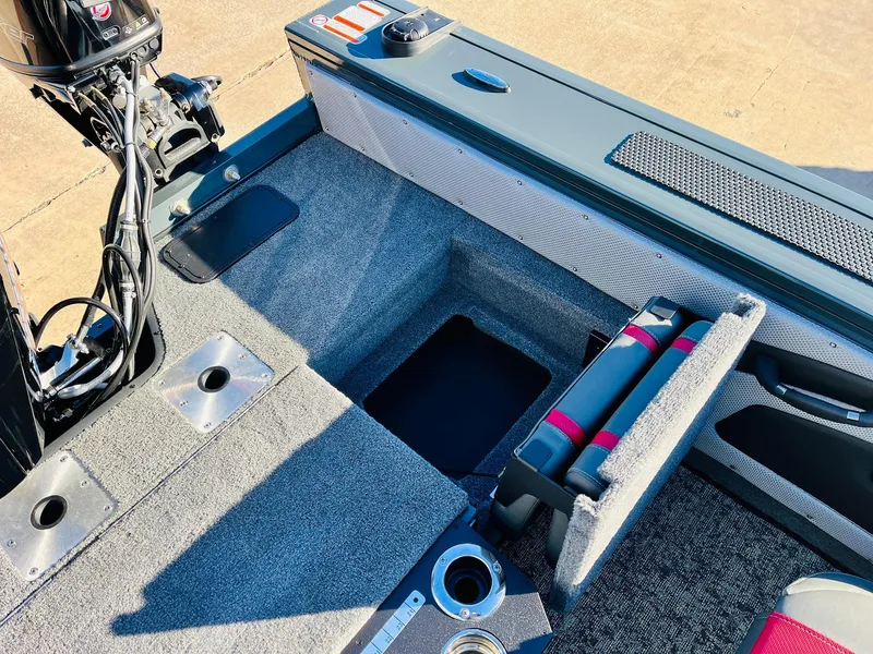 Slide: The Image of 2025 Ranger VX1988 WT boat interior with storage compartments and seating. - 48