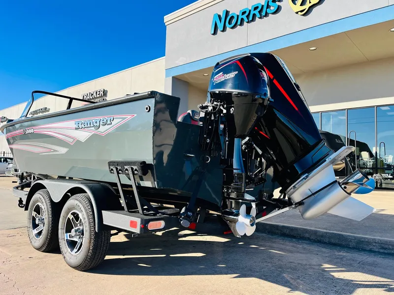 Slide: The Image of 2025 Ranger VX1988 WT boat on trailer outside dealership. - 7