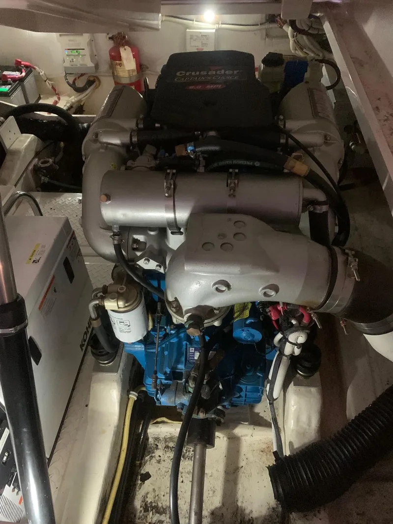 Slide: The Image of Engine room of 2012 Tiara Yachts 3100 Coronet, showcasing detailed machinery. - 9