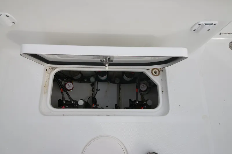 Slide: The Image of Open hatch of 2016 Sea Hunt Gamefish 30, revealing internal compartment. - 30