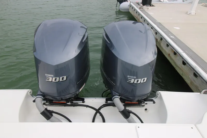 Slide: The Image of Twin Yamaha 300 outboard engines on a 2016 Sea Hunt Gamefish 30 boat. - 38