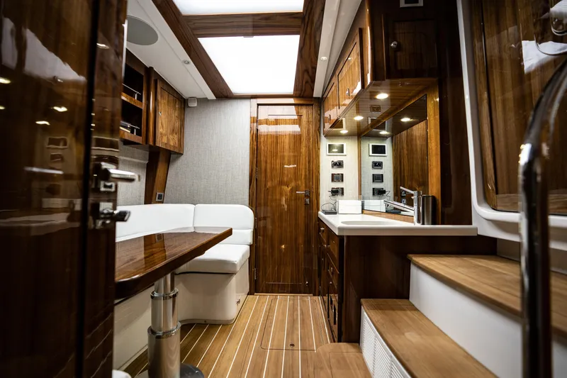 Slide: The Image of Luxurious interior of 2023 HCB 65 Estrella yacht with wood finishes and modern amenities. - 26