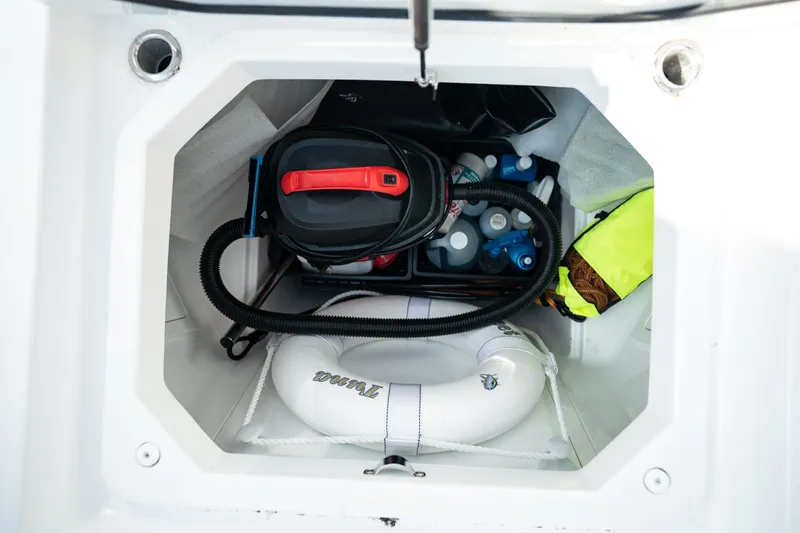 Slide: The Image of Storage compartment of 2023 HCB 65 Estrella boat with equipment and supplies. - 31