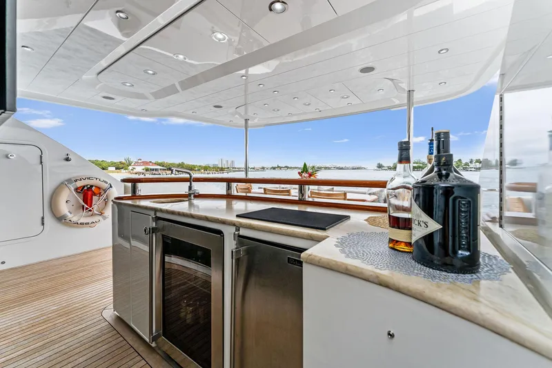 Slide: The Image of Luxurious 2006 Palmer Johnson motor yacht deck with sleek design and elegant wood finishes. - 19