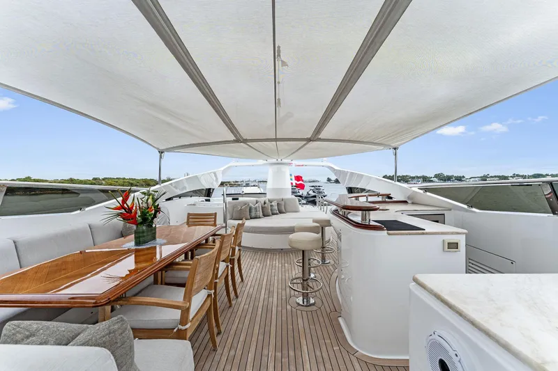 Slide: The Image of Luxurious 2006 Palmer Johnson motor yacht deck with seating and canopy. - 22