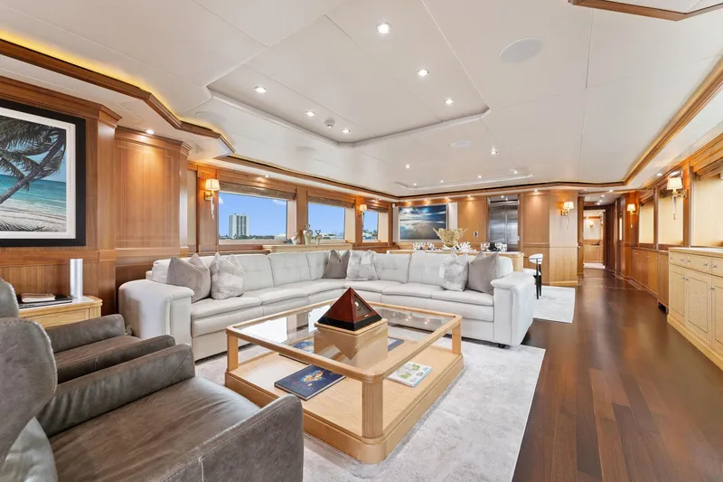 Slide: The Image of Luxurious interior of a 2006 Palmer Johnson motor yacht with elegant wood finishes and spacious seating. - 32