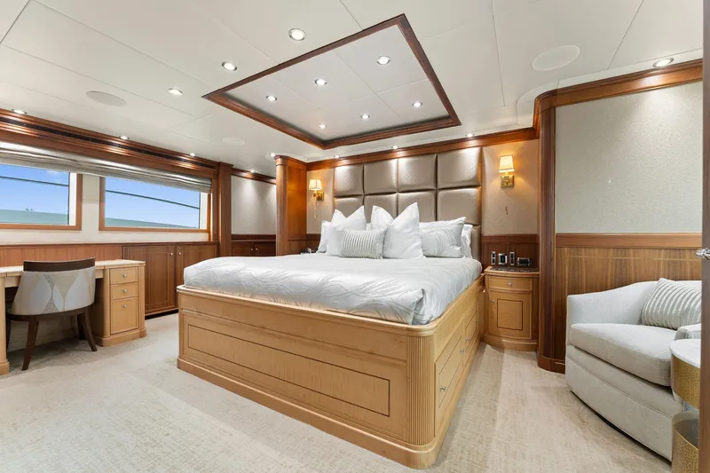 Slide: The Image of Luxurious 2006 Palmer Johnson motor yacht interior with elegant seating and wood paneling. - 42