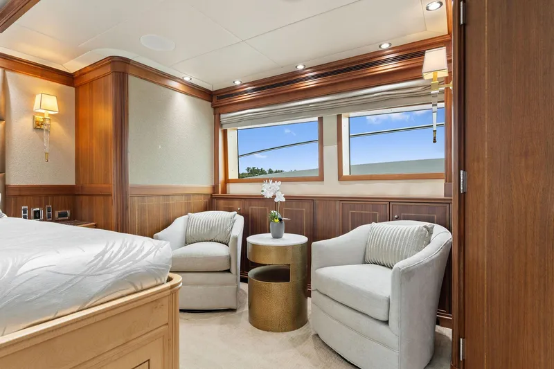 Slide: The Image of Luxurious 2006 Palmer Johnson motor yacht bedroom with elegant wood finishes and modern amenities. - 43