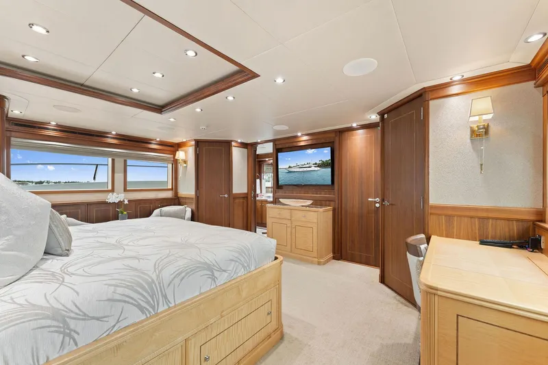 Slide: The Image of Luxurious interior of 2006 Palmer Johnson motor yacht with elegant wood paneling and staircase. - 44