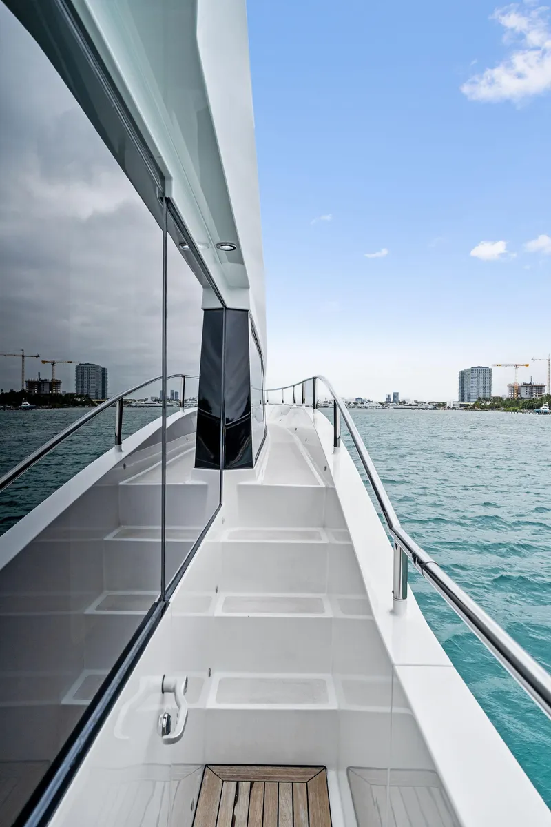 Slide: The Image of Bow view of 2006 Palmer Johnson motor yacht on open water. - 8