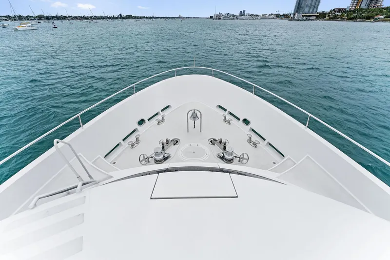 Slide: The Image of Palmer Johnson 2006 motor yacht deck with ocean view and clear sky. - 9
