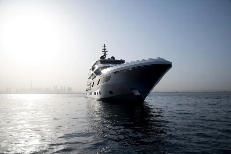 Slide: The Image of Luxury Majesty 175 yacht cruising at sunrise, 2026 model. - 12