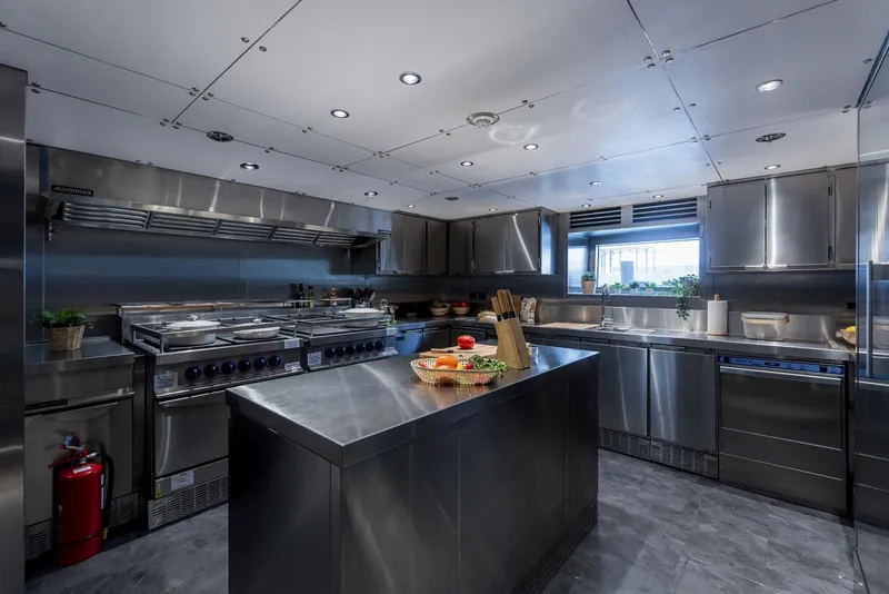 Slide: The Image of Modern stainless steel kitchen on 2026 Majesty 175 yacht, featuring professional appliances and sleek design. - 32