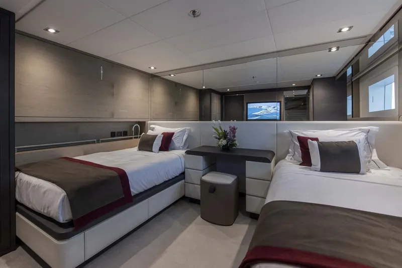 Slide: The Image of Luxurious twin bedroom on 2026 Majesty 175 yacht, featuring modern decor and elegant lighting. - 37